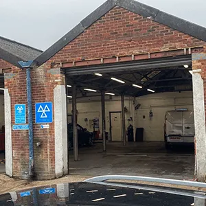 a garage with a car parked in it