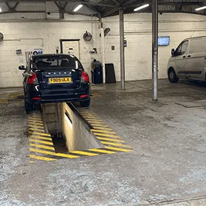 a car is parked in a parking garage