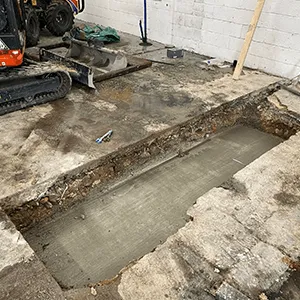 a construction site with a hole in the ground